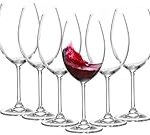 Descubre los Mejores Cócteles: Comparación de Sabores y Aromas entre Vino Blanco y Tinto en Copas Elegantes